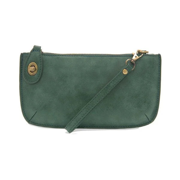 The Sak Mini Leather Wrist Bag featured in a Lux Crossbody Wristlet Clutch