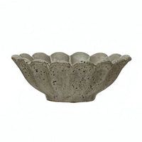 Scalloped concrete bowl featuring a textured, distressed finish for stoneware flower bowls