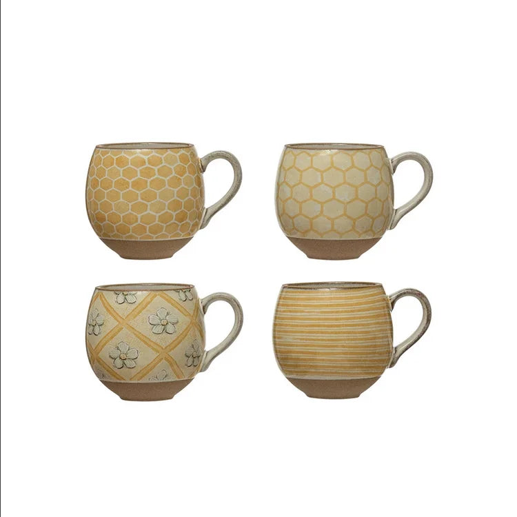 Set of four Bee Pattern Stoneware Mugs with yellow and beige designs for coffee