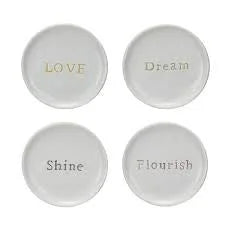 Set of four white ceramic plates with inspirational words for women’s boho chic clothing