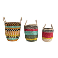 Set of three colorful seagrass baskets with handles from Shop Daisy for stylish storage