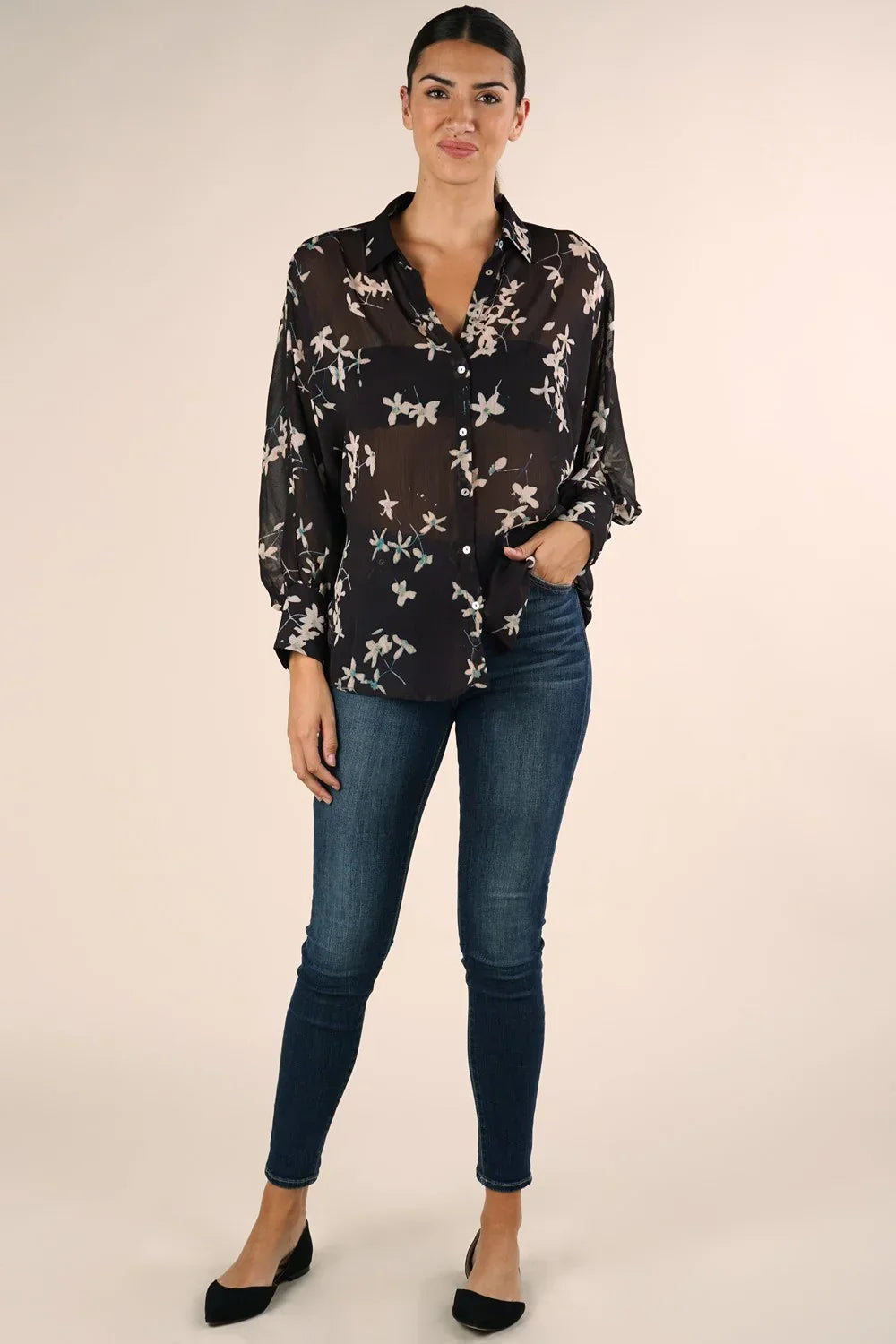 Sheer long sleeve black button-up shirt with white floral patterns for stylish women
