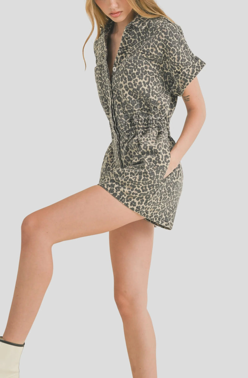 Short-sleeved leopard print romper with pockets from Shop Daisy, perfect for women’s boho chic clothing