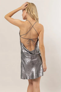 Shimmering silver backless mini dress from Shop Daisy, perfect for women’s boho chic clothing