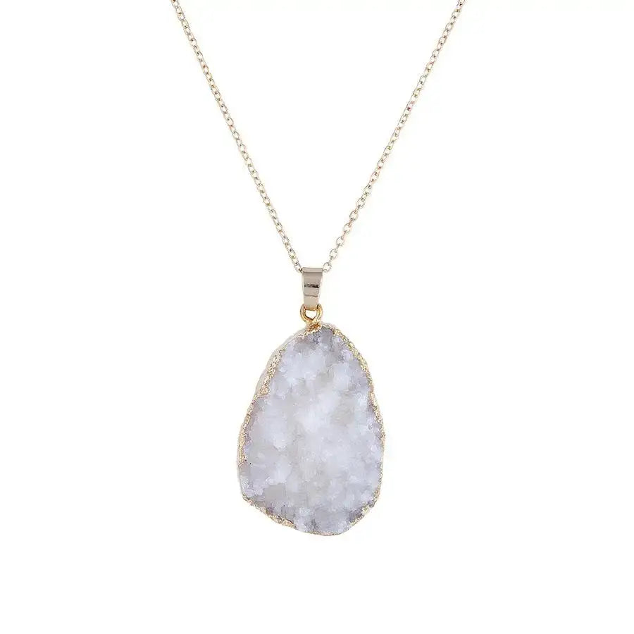 Silver chain necklace featuring a white quartz geode pendant, a genuine stone necklace elegance
