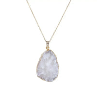Silver chain necklace featuring a white quartz geode pendant, a genuine stone necklace elegance