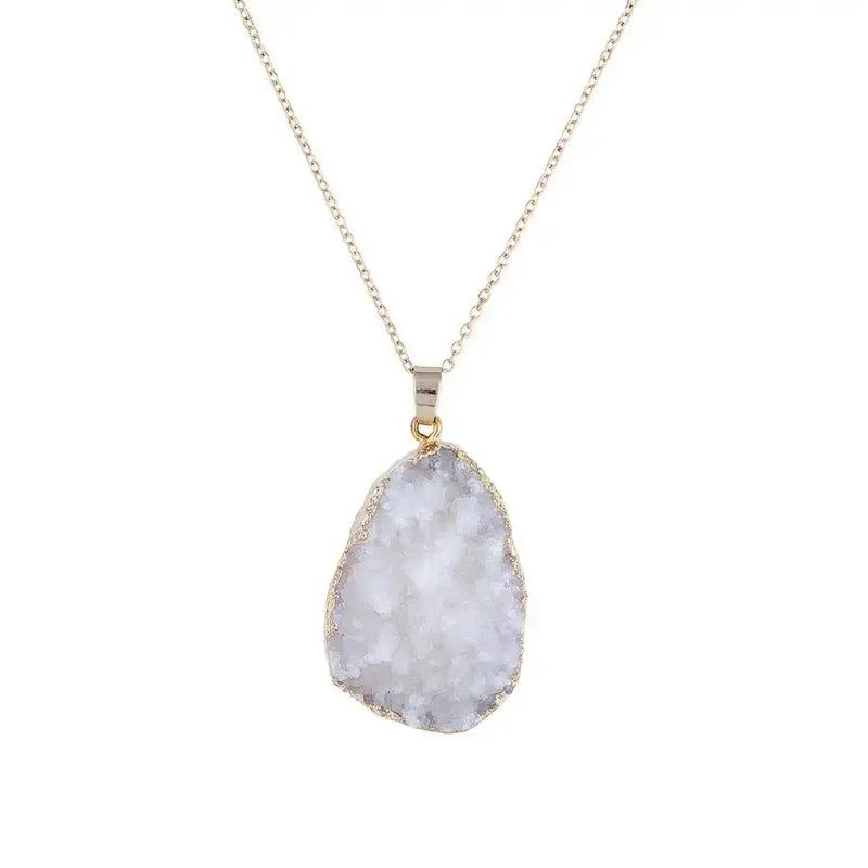 Silver chain necklace featuring a white quartz geode pendant, a genuine stone necklace elegance
