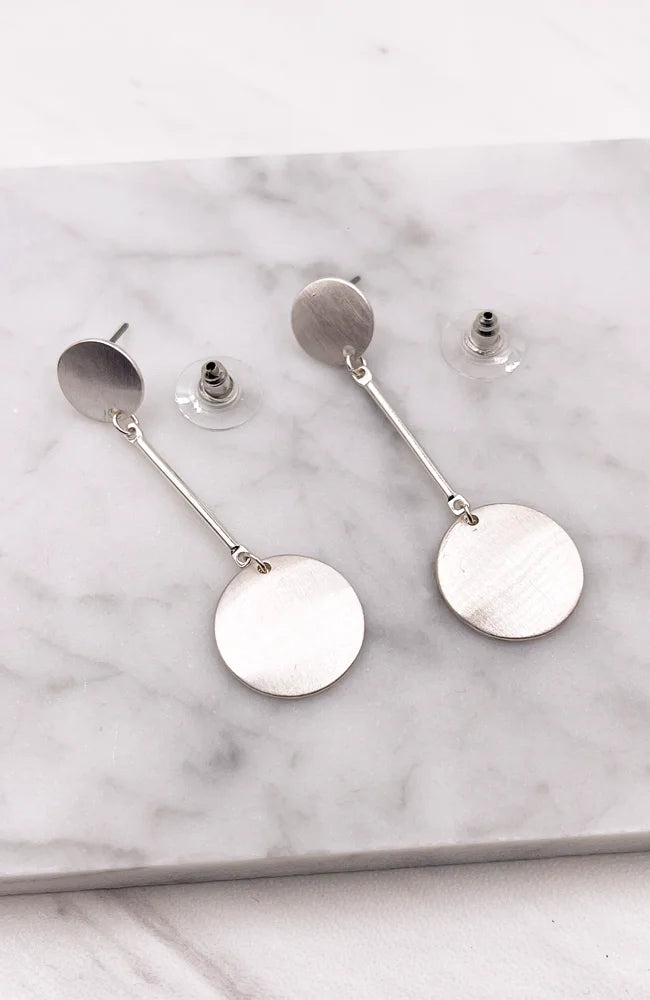 Hanging Circle Silver Earrings showcasing elegant silver circle shape design