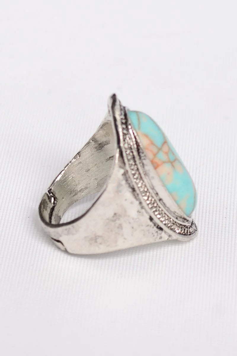 Silver vintage turquoise ring featuring a stunning center turquoise stone