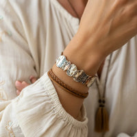 Bohemian multi-tone textured bracelet with silver skull and brown leather strap