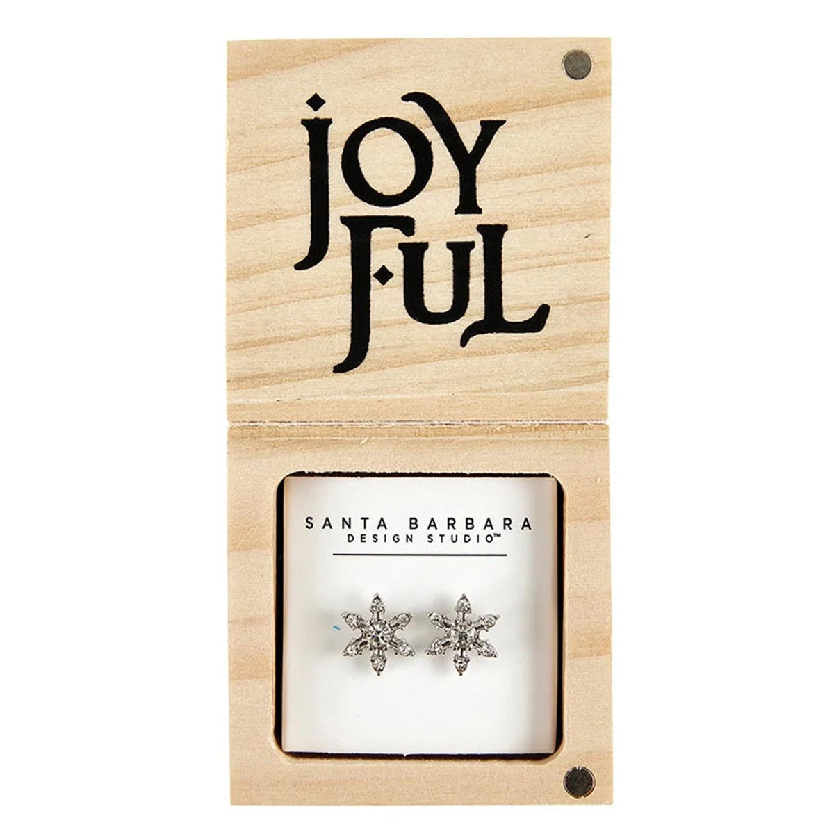 Silver snowflake shaped earrings elegantly displayed on a Joyful wooden card
