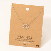 Silver wave pendant necklace from the WAVE CUTOUT COIN PENDANT NECKLACE collection