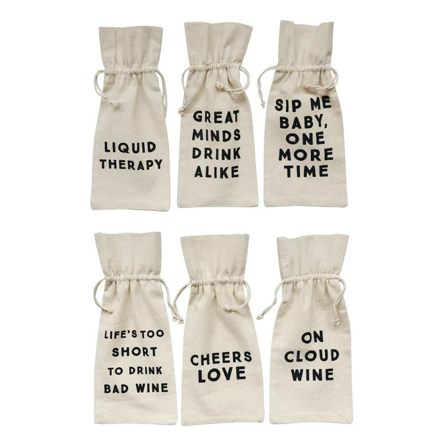 Six canvas wine bags featuring humorous phrases, available at Shop Daisy for stylish storage