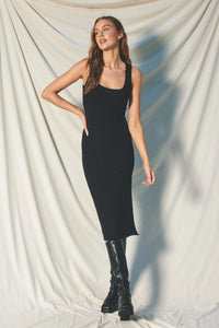 Sleek ribbed knit square neck bodycon midi dress paired with knee-high boots