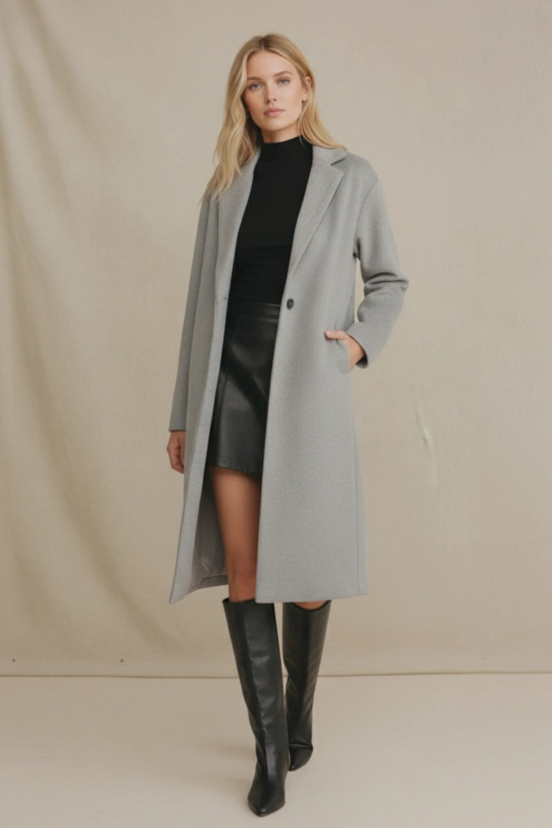 Oversized fit earthy long coat in sleek light gray wool with double-breasted design