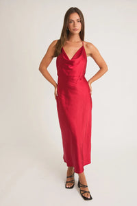 Sleek red satin slip dress with spaghetti straps from Shop Daisy’s women’s boho chic clothing