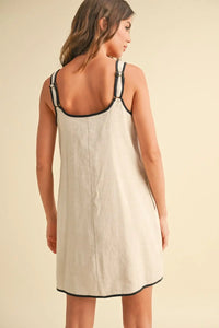 Beige sleeveless dress with black trim from Shop Daisy women’s boho chic clothing