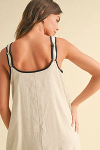 Linen sleeveless piping detail dress in beige with black trim, perfect for women’s boho chic clothing, shop Daisy