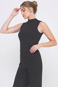 Soft lurex gauge sleeveless mock neck top with matching wide-leg trousers for elegant style