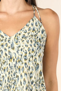Animal print spaghetti strap tank top with blue, green, and cream leopard print