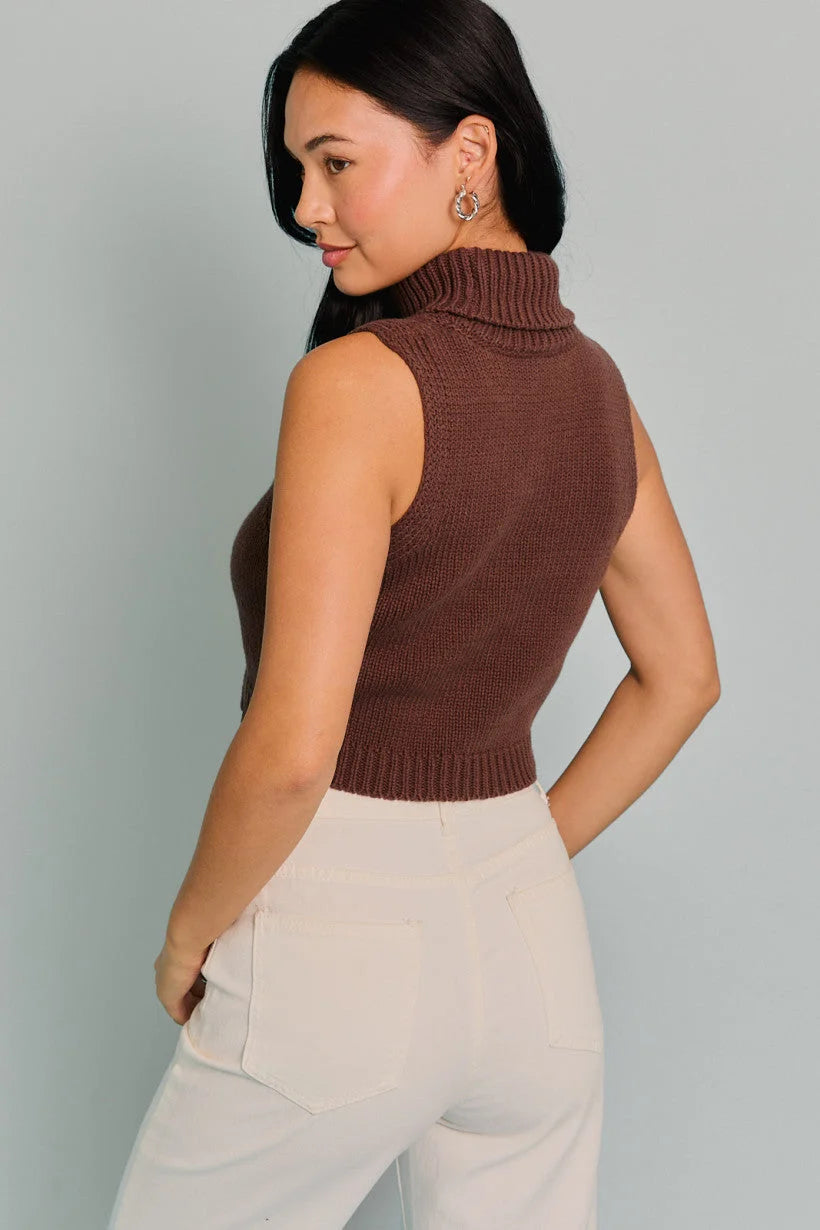 Sleeveless brown turtleneck sweater showcased in the Turtle Neck Sleeveless Cropped Joy Top