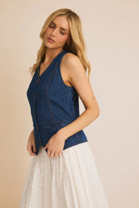 Sleeveless denim vest with zipper front, perfect for women’s boho chic clothing at Shop Daisy