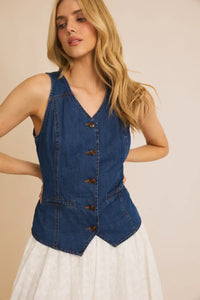 Sleeveless denim vest with brown buttons and v-neckline from Shop Daisy womens boho clothes