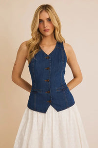 Sleeveless denim vest with button closures for women’s boho chic clothing at Shop Daisy