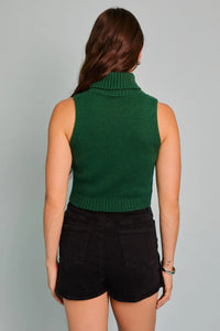 Sleeveless green turtleneck sweater showcased on a model, highlighting the Sleeveless Cropped Joy Top