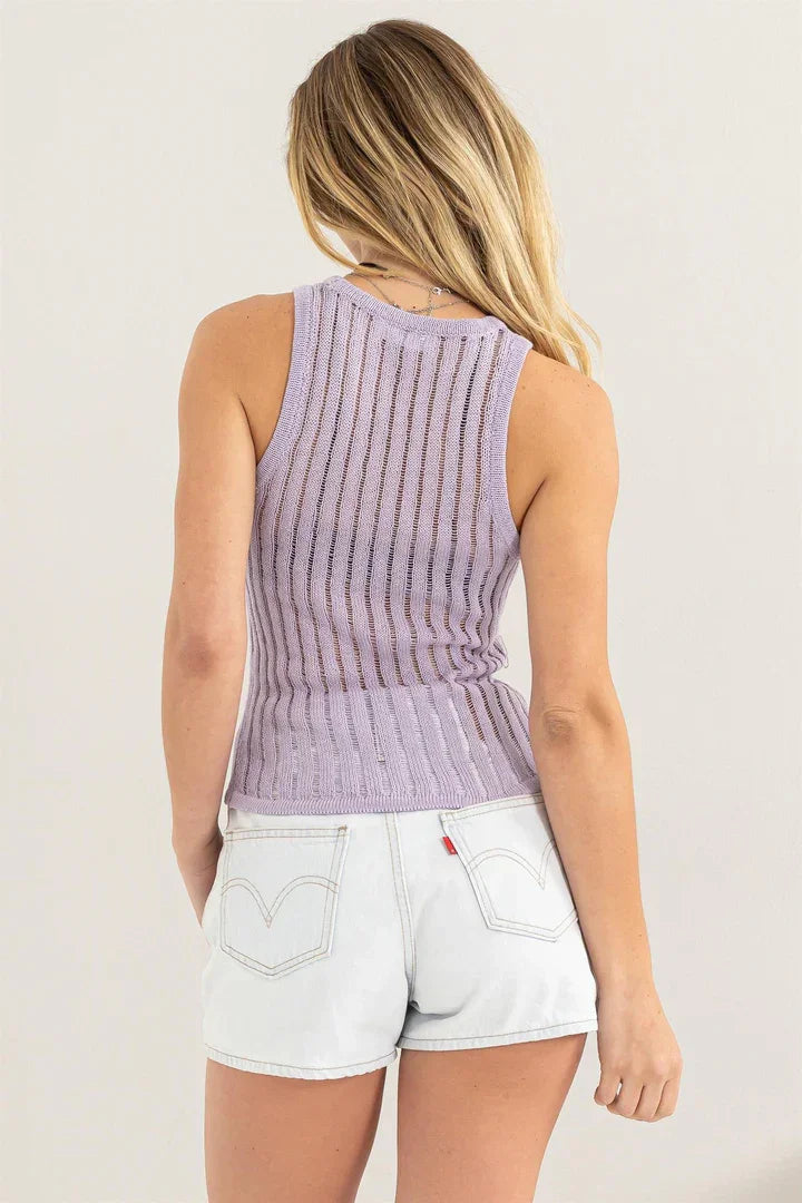 Sleeveless lavender open knit sweater tank top with white shorts, boho style flair