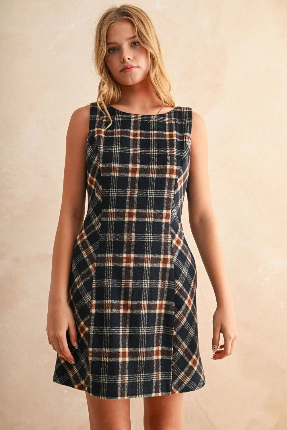Plaid pattern mini dress with sleeveless design and boat neck for stylish wear