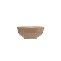 Small brown round stoneware bowl on a white background for kitchen décor