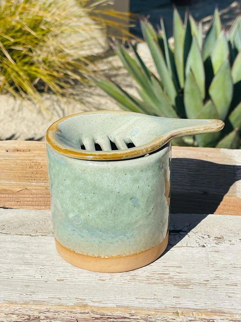 Small green pot with wooden spoon featured in TEA MUG, CUP & SAUCER collection