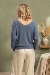 Soft blue v-neck long sleeve sweater top with relaxed fit