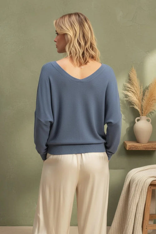 Soft blue v-neck long sleeve sweater top with relaxed fit