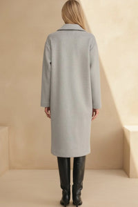 Oversized fit earthy long coat in soft light gray wool with classic collar