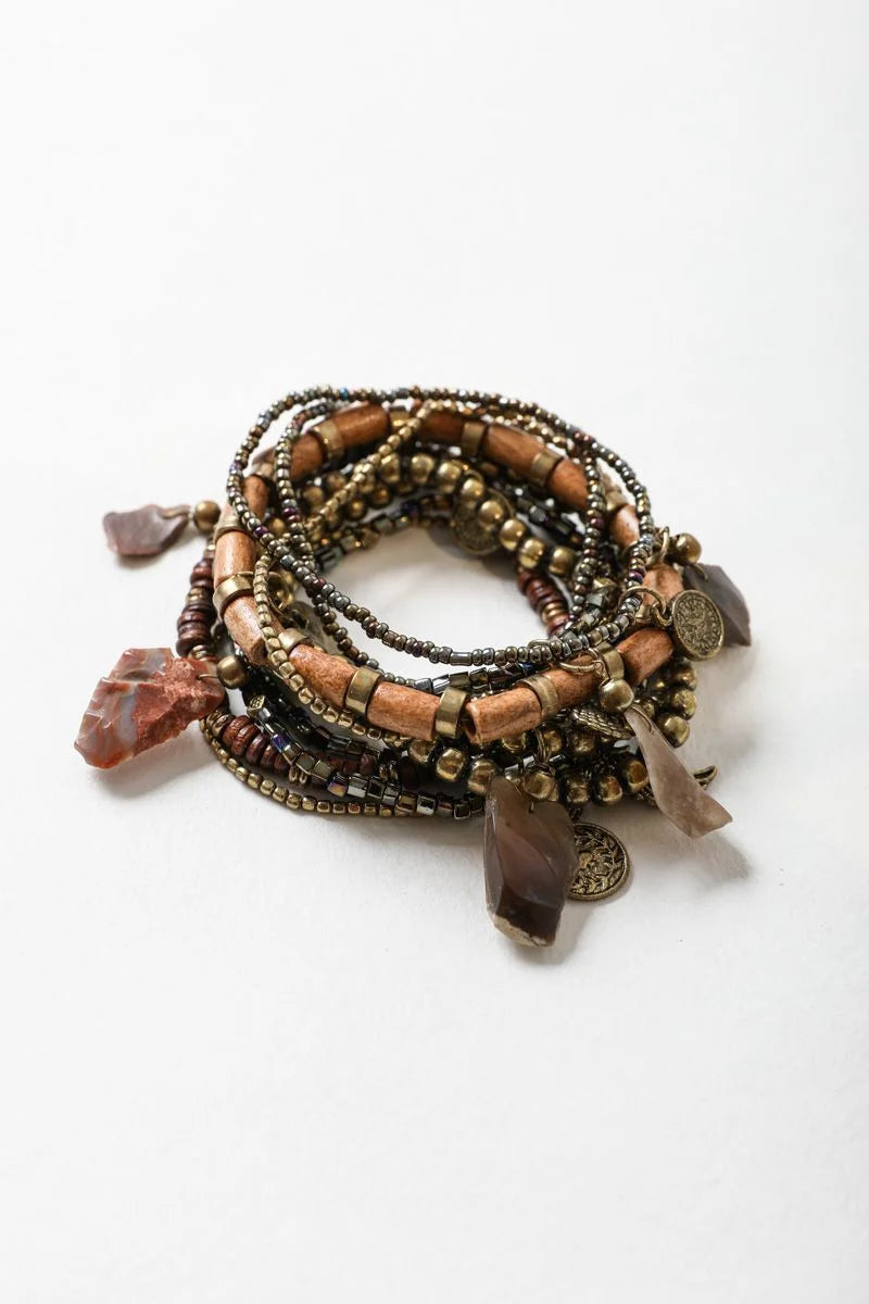 Stack of Bohemian Stone and Bead Stack Bracelet with various charms displayed elegantly