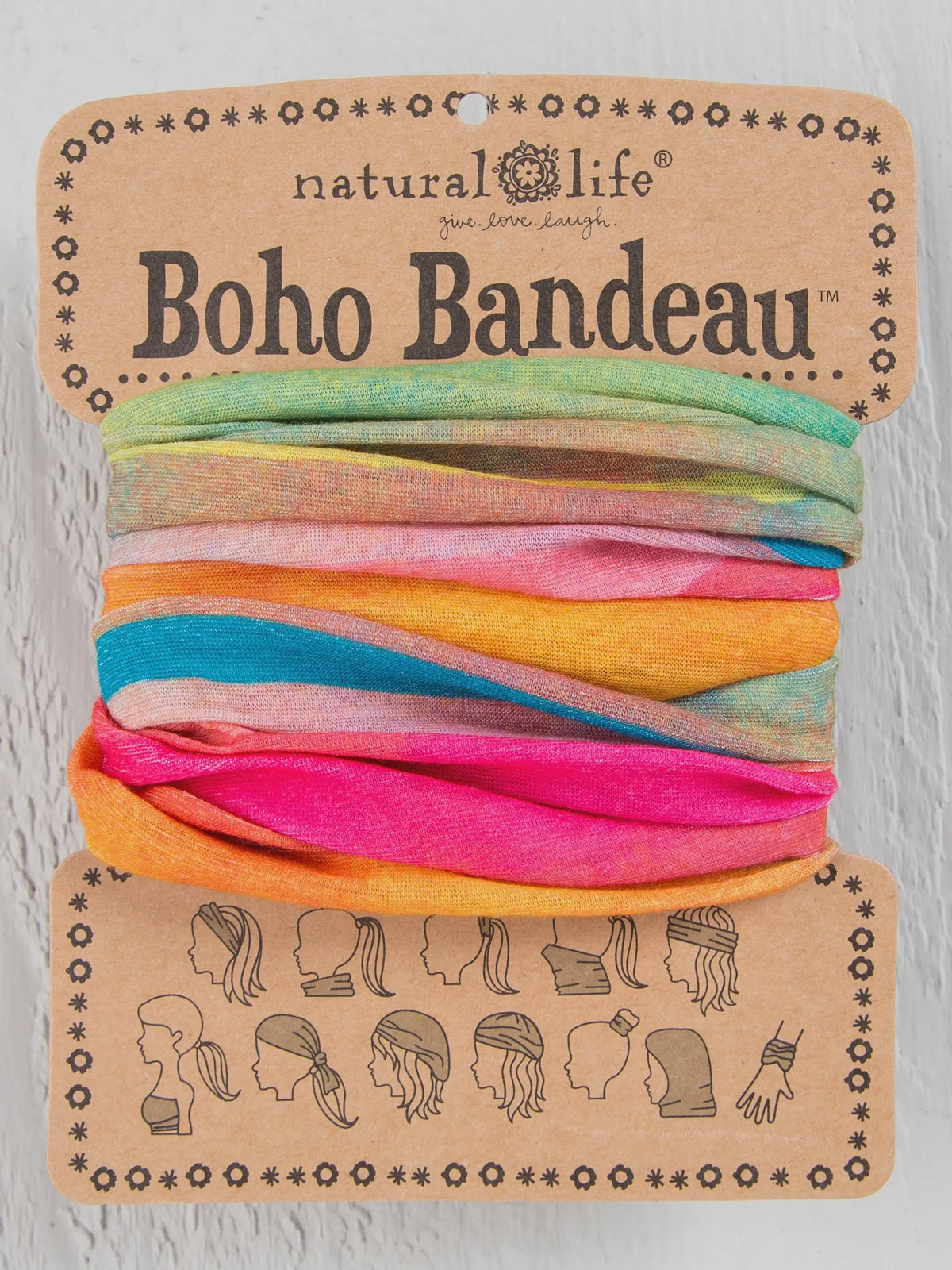 Colorful hair ties stacked for the FULL BOHO BANDEAU HEADBAND - RAINBOW OMBRE display