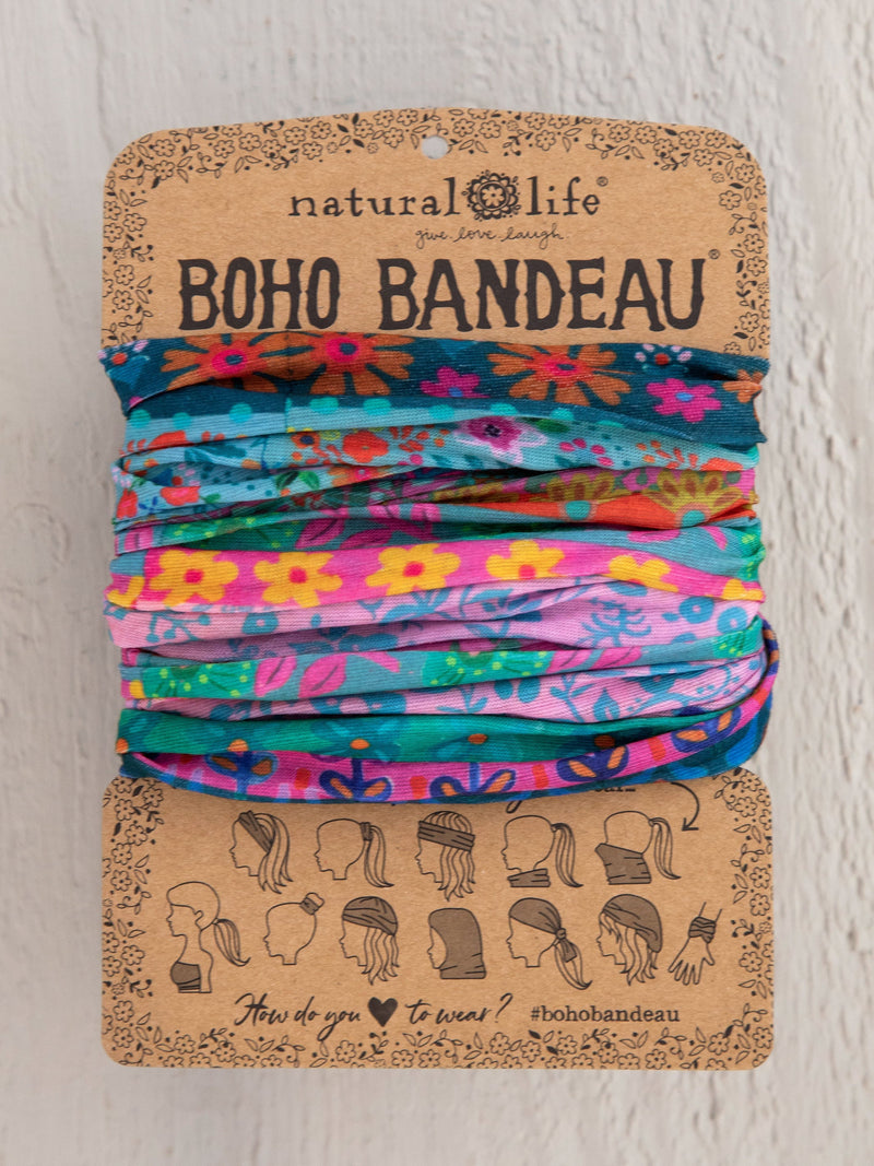 Colorful stack of hair ties with brown tag displayed in product FULL BOHO BANDEAU HEADBAND - BLUE PINK BORDER