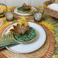 Stoneware flower shaped dish with textured green bowl and brown lotus design
