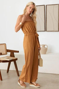 Strapless camel jumpsuit with wide-leg silhouette and boho smocked neck line design