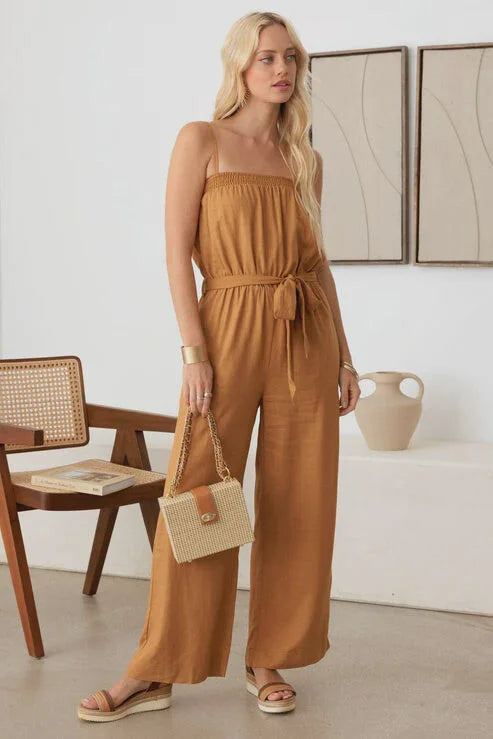 Strapless caramel jumpsuit with wide-leg pants and boho smocked neck line design