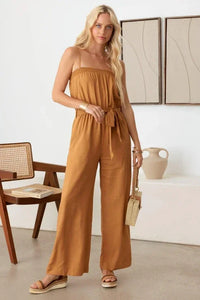 Strapless mustard Tie Waist Linen jumpsuit with boho smocked neck line and flowy legs