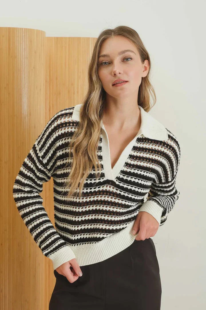 Striped black and white long sleeve crochet knit sweater with collar and button placket