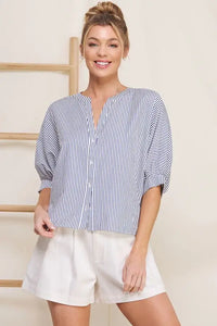 Striped blue and white Easy Pinstripe Seersucker Button blouse with white shorts