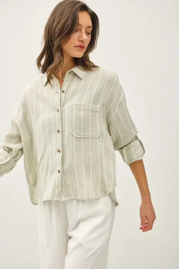 Striped gauze button-up top featuring a stylish button-down design and vibrant stripes