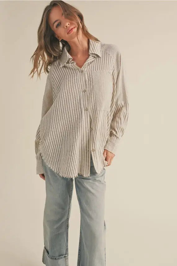 Multi stripe pattern button-down shirt styled with jeans for a casual look