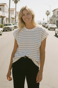 Striped cotton Bella Tee with rolled sleeves and black pants