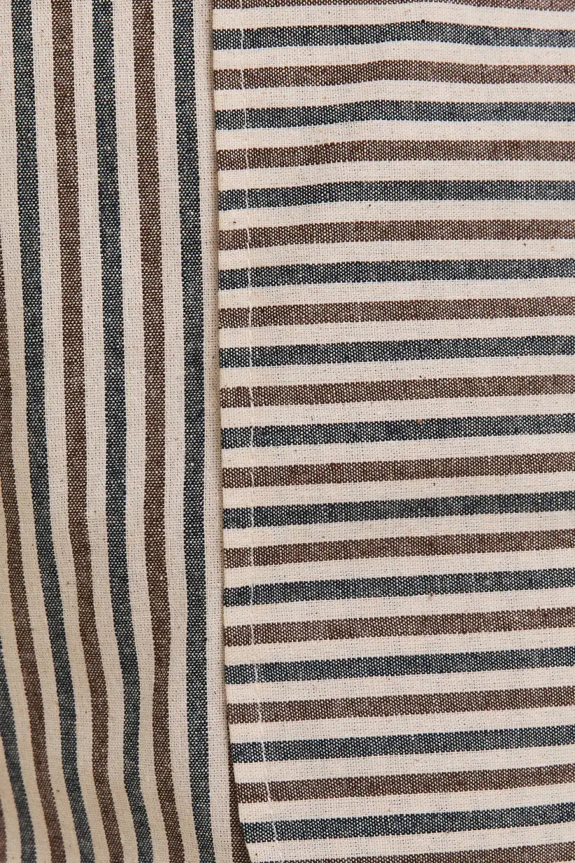 Striped fabric with visible seam on Stripe Pocket Shorts showcasing stylish pocket shorts design