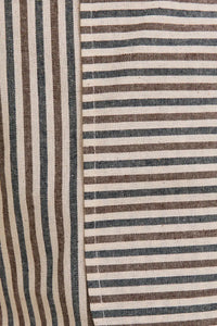 Striped fabric with visible seam on Stripe Pocket Shorts showcasing stylish pocket shorts design
